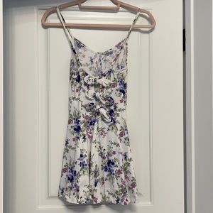 Floral romper with bows down back